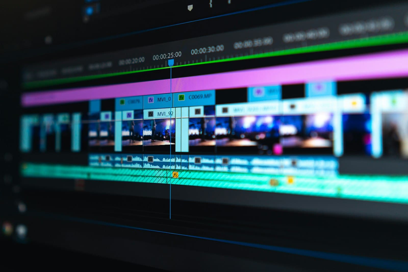 Video editing workstation with footage on a large monitor