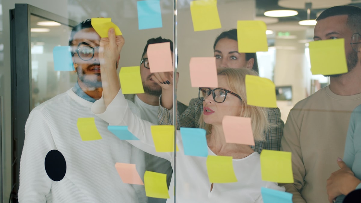 Marketing team planning and measuring campaign strategy